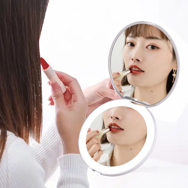 The mirror being used at a vanity table and packed in a suitcase for travel