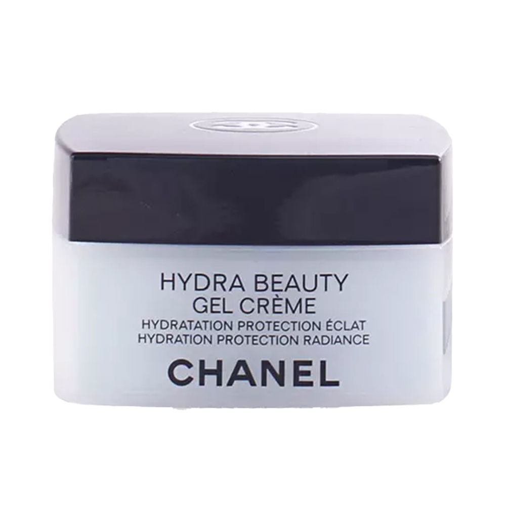 Chanel Hydra Beauty Camellia Micro Crème 50g luxury moisturizer with white camellia flowers on marble surface
