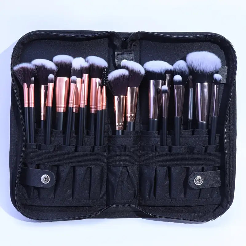 The bag being filled with various makeup brushes (with disclaimer overlay)