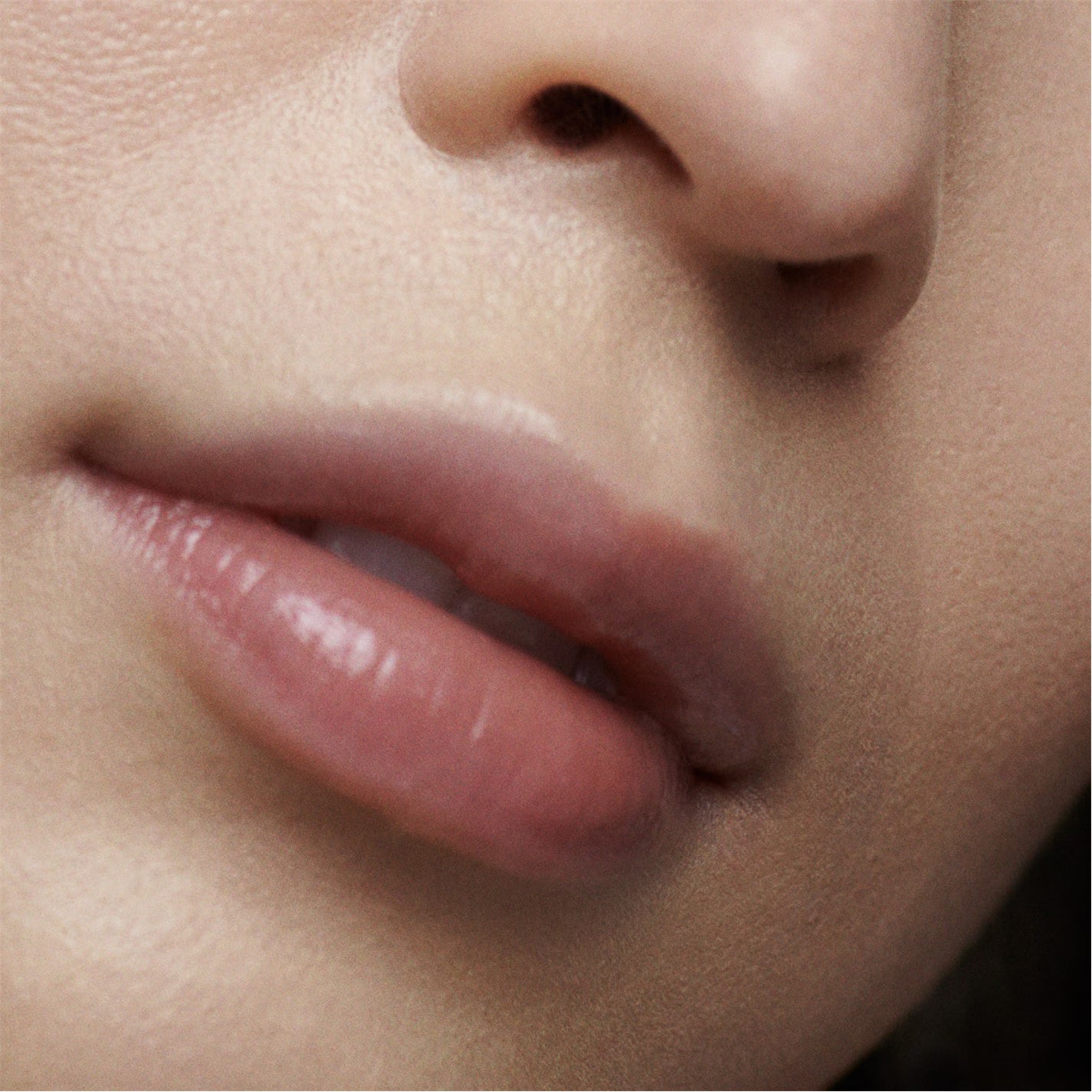 Applying Fresh Sugar Advanced Therapy Lip Balm to dry lips