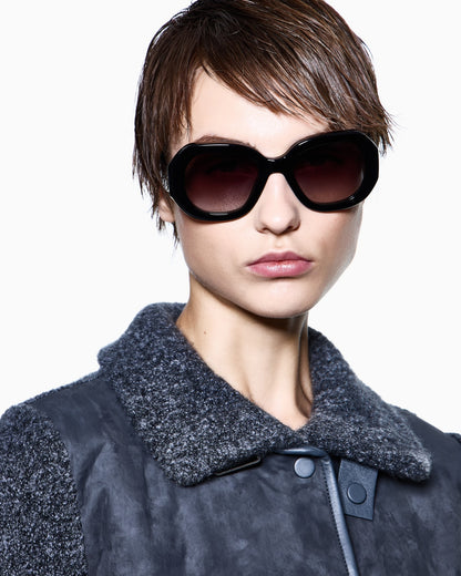 Woman wearing Giorgio Armani oversized acetate sunglasses