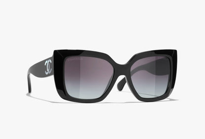 Chanel acetate butterfly sunglasses front view with CC logo detail