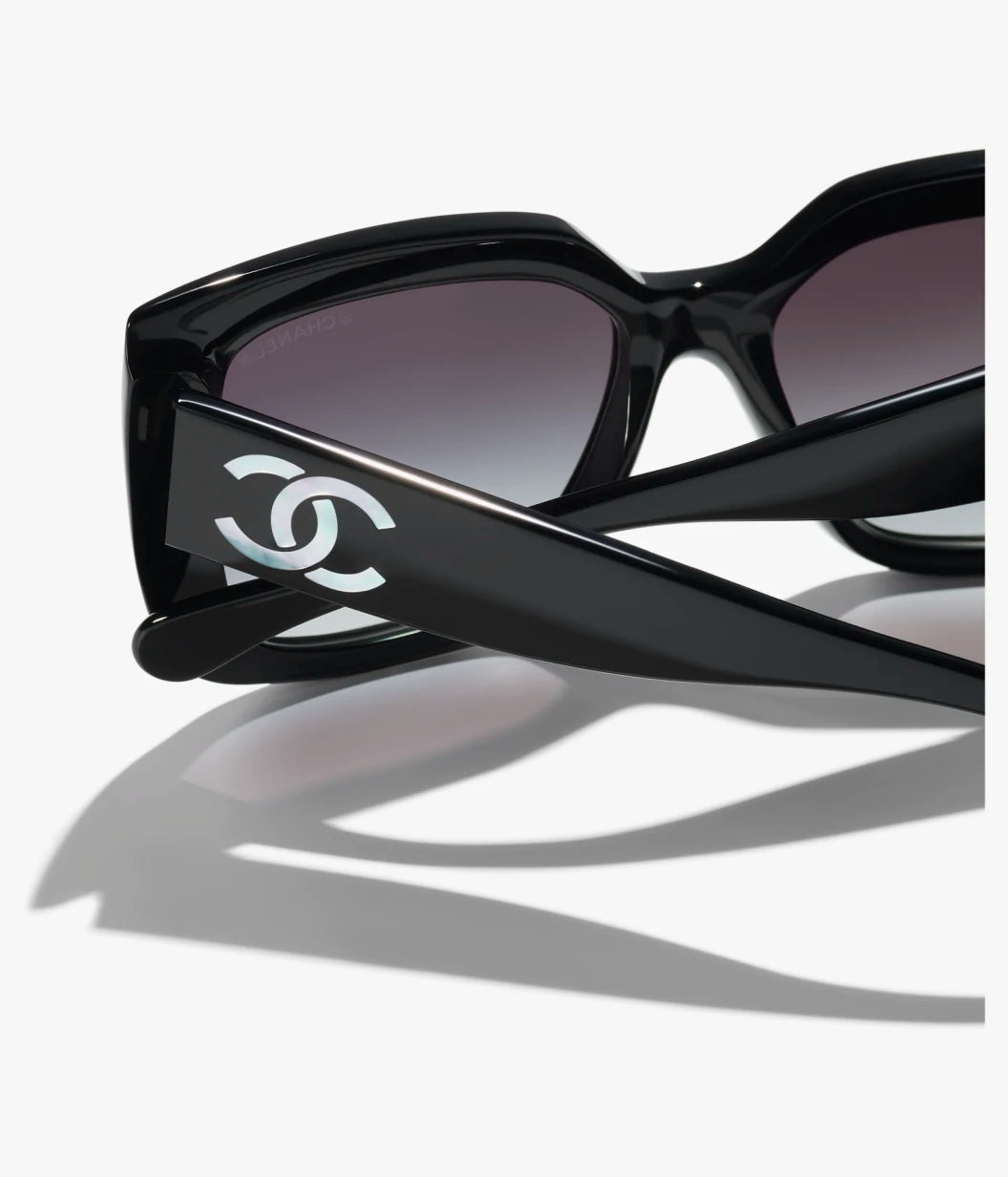Chanel interlocking CC logo detail on butterfly sunglasses temple