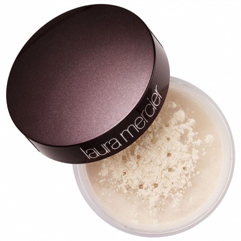 Laura Mercier Translucent Setting Powder texture close-up showing ultra-fine blurring powder for long-lasting makeup setting
