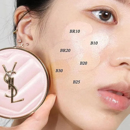 Woman applying YSL Touche Eclat Glow-Pact Cushion foundation